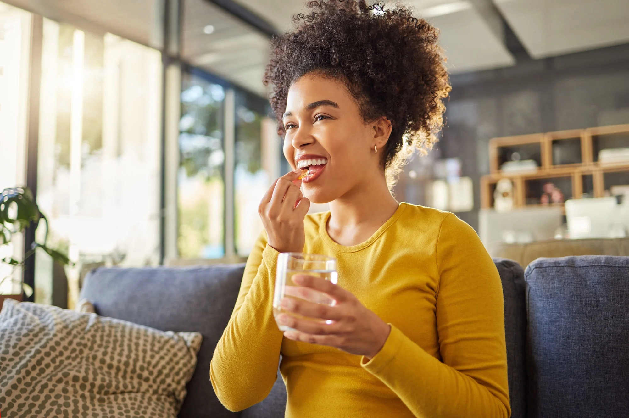 woman taking vitamin
