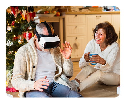 man using VR headset while woman watches