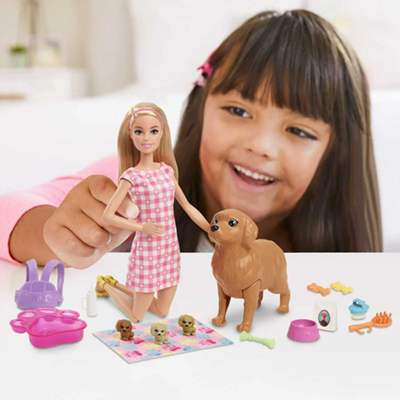 child playing with barbie doll