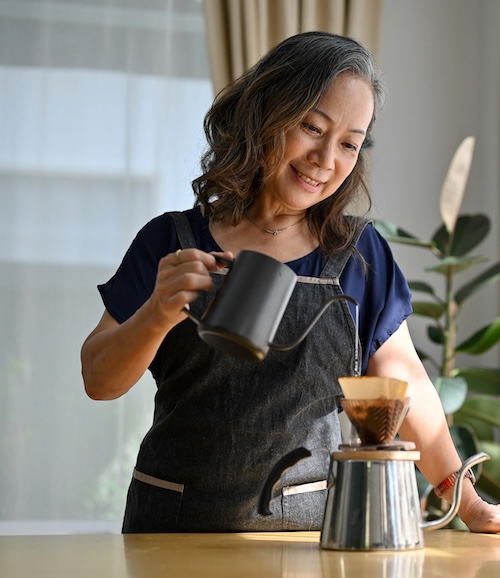 woman pouring coffee